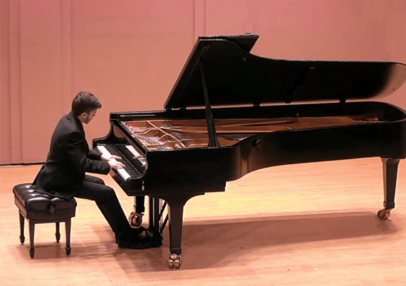 Tomas playing the piano