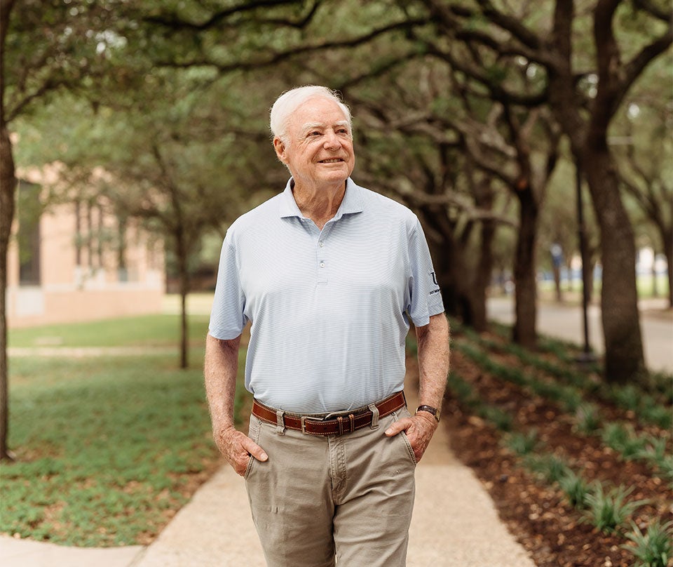 Cordell walking on campus