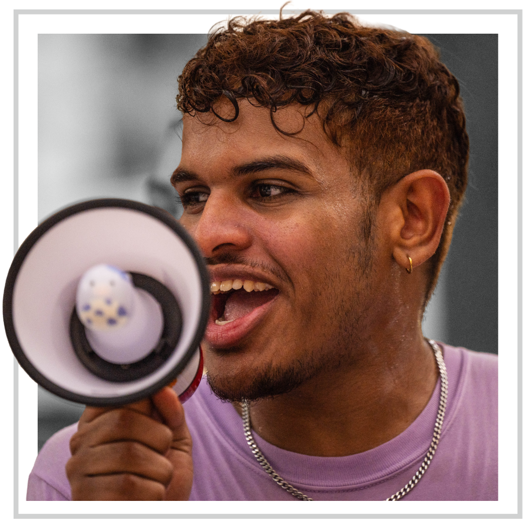 Rice student speaking through megaphone