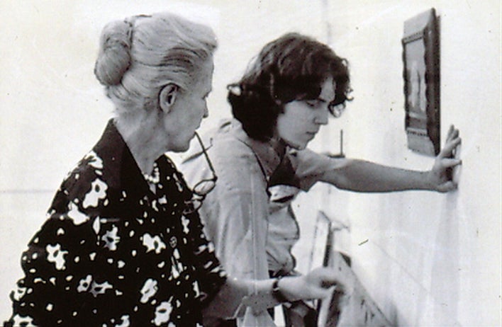 Dominique De Menil with a student